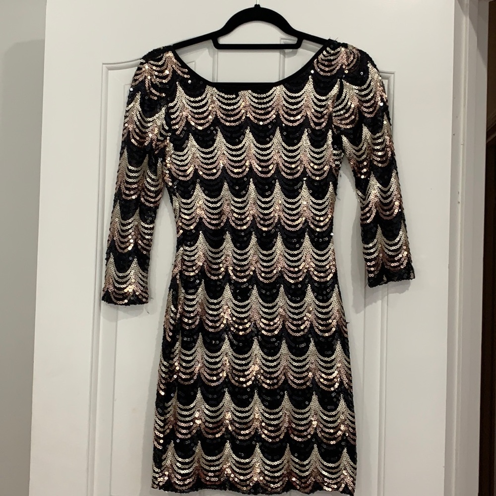 Gold and black sequence cocktail dress.